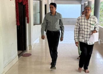 District Collector Dr. G. Lakshmisha inspecting arrangements at an APPSC examination centre at CVR Girls Municipal High School to ensure smooth conduct of exams.