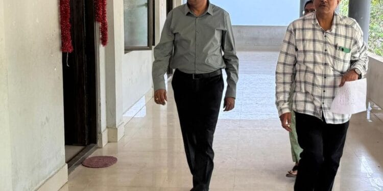 District Collector Dr. G. Lakshmisha inspecting arrangements at an APPSC examination centre at CVR Girls Municipal High School to ensure smooth conduct of exams.