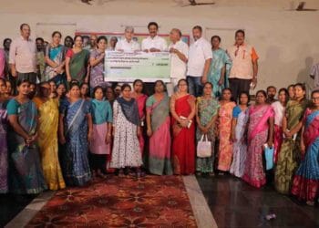 KDCC Bank Loan Distribution Programme where ₹4 crore loans were distributed to DWACRA women and farmers