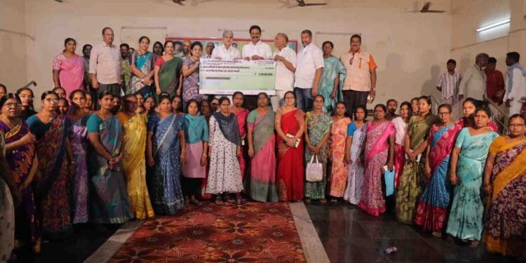 KDCC Bank Loan Distribution Programme where ₹4 crore loans were distributed to DWACRA women and farmers