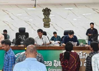 ASR District Collector Dinesh Kumar addressing grievance meeting in Paderu