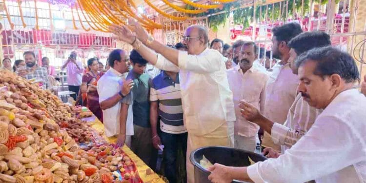 MLA Bolisetti Srinivas announcing Balusulamma Annadanam Trust at Tadepalligudem temple event