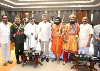 Andhra Pradesh Chief Minister Chandrababu Naidu presenting awards to MLAs and MLCs during the cultural program in Vijayawada.