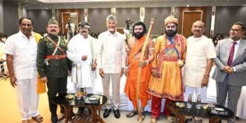 Andhra Pradesh Chief Minister Chandrababu Naidu presenting awards to MLAs and MLCs during the cultural program in Vijayawada.