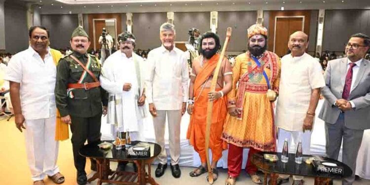 Andhra Pradesh Chief Minister Chandrababu Naidu presenting awards to MLAs and MLCs during the cultural program in Vijayawada.