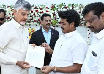 CM Chandrababu Naidu handing over cheque for Polavaram displaced families in Mangalagiri