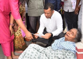 Nellore Collector Himanshu Shukla helping elderly woman get her house back