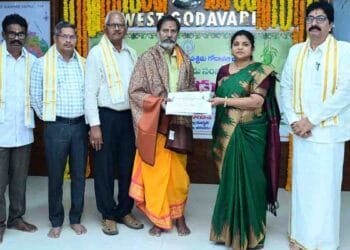 District Collector Nagarani lighting lamp during Ugadi Celebrations in Bhimavaram 2026