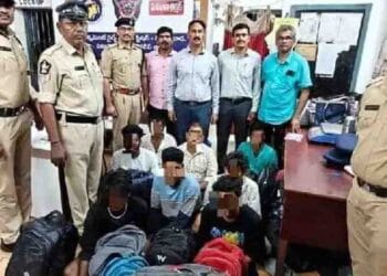 Police seizing 65 kg ganja at Vijayawada Railway Station during inspection