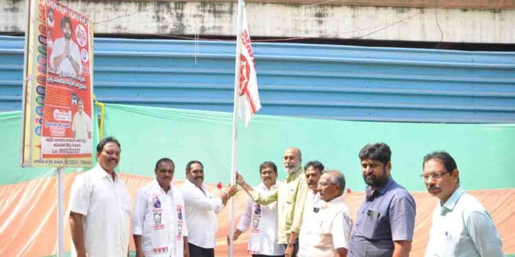 Jana Sena Party leaders celebrating 13th Foundation Day in Guntur