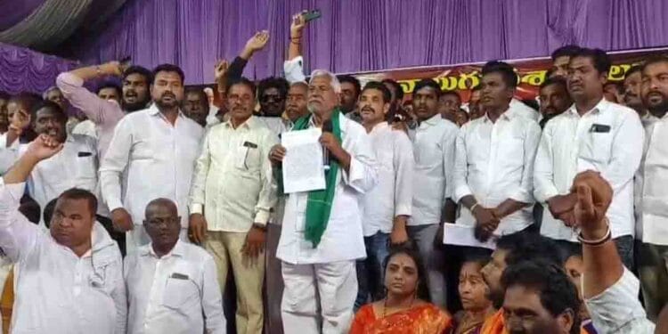 eevan Reddy walking with supporters after resigning from Congress in Jagtial