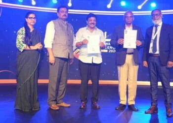 Andhra Pradesh Tourism Minister Kandula Durgesh signing MoU for the Visakhapatnam Amusement Park Project during IAAPI Expo 2026 in Mumbai.