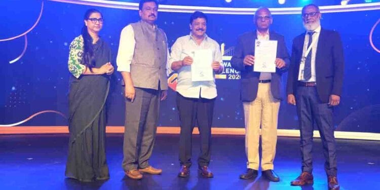 Andhra Pradesh Tourism Minister Kandula Durgesh signing MoU for the Visakhapatnam Amusement Park Project during IAAPI Expo 2026 in Mumbai.