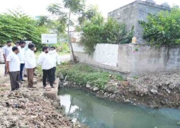 TDP leaders inspecting drainage issues in Ravindra Nagar Nellore Rural