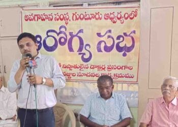 Doctor explaining liver and digestive health awareness at a medical seminar