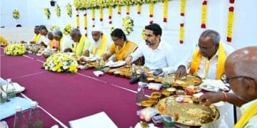 Nara Lokesh interacting with TDP party workers during foundation day event
