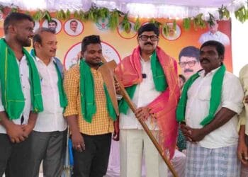 Minister distributing Pattadar passbooks under Mee Bhoomi Mee Hakku Programme