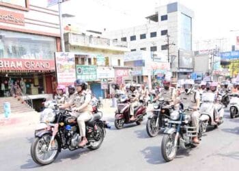 Eluru SP K. Pratap Shiva Kishore flagging off women safety motorcycle rally on International Women’s Day in Eluru
