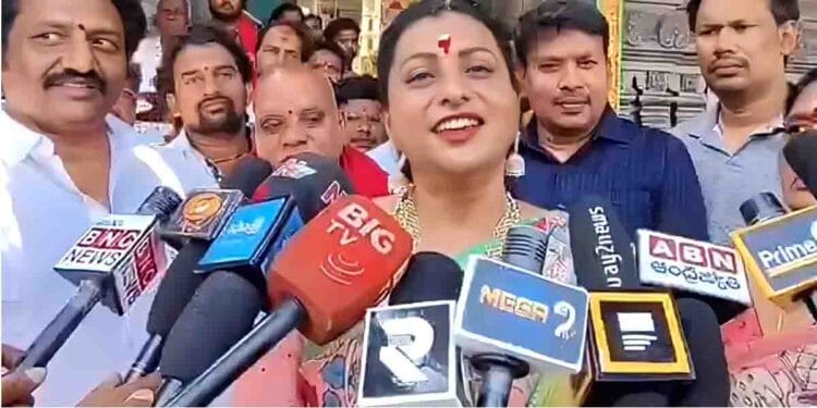 Former minister Roja speaking to media after visiting Sri Someshwara Janardhana Swamy Temple in Bhimavaram.