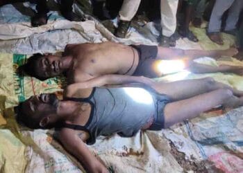 Police and locals conducting search operation at Dora Mamidi reservoir after drowning incident