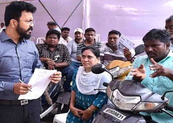 Guntur Collector Sai Kanth Varma meeting persons with disabilities at PGRS event