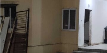 Damaged walls and unauthorized construction activity in TIDCO housing complex