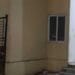 Damaged walls and unauthorized construction activity in TIDCO housing complex